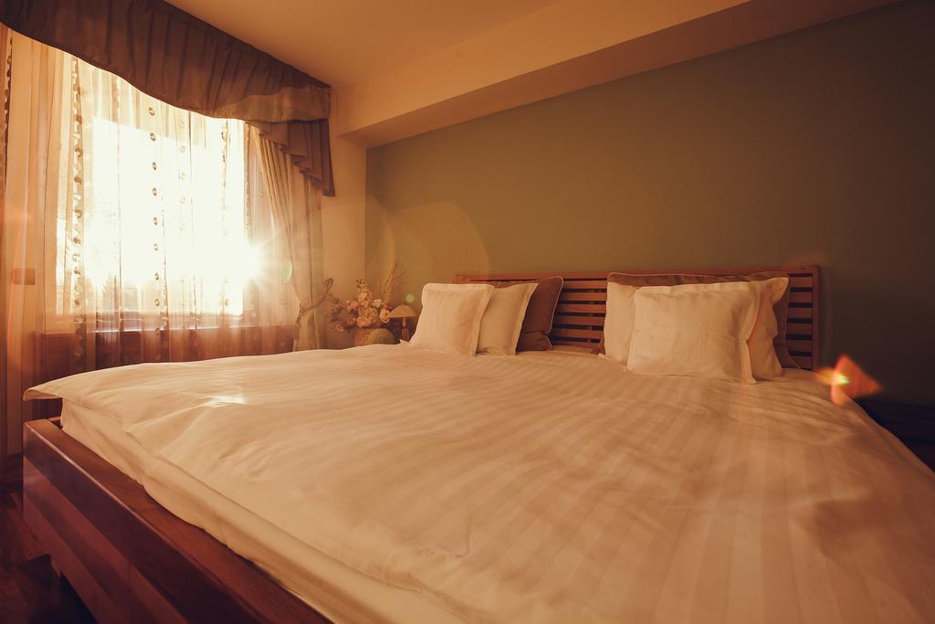 Suită deluxe cu un singur dormitor (2 adulţi + 2 copii)